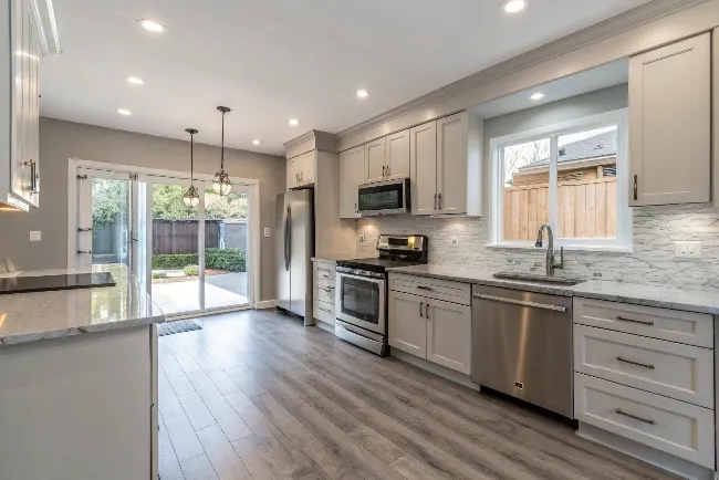 Window technician installing a window